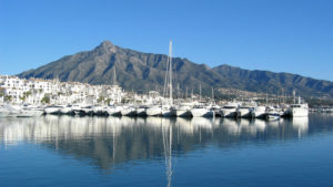 World-famous picture of Marbella's Puerto Banus with the mountains in the background.