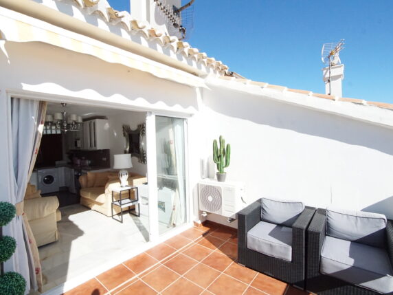 Image 2 of 8 - Lovely penthouse apartment in small community with sunning sea views