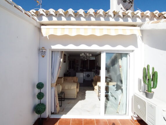 Image 4 of 8 - Lovely penthouse apartment in small community with sunning sea views