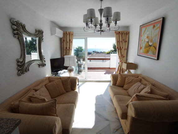 Image 7 of 8 - Lovely penthouse apartment in small community with sunning sea views